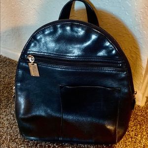 Tignanello Black Leather Sling Backpack Bag